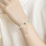 Silver Butterfly Green Cord Bracelet