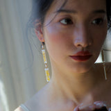 Golden Wave Pearl Drop Earrings