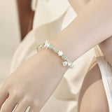 Silver Butterfly Green Cord Bracelet